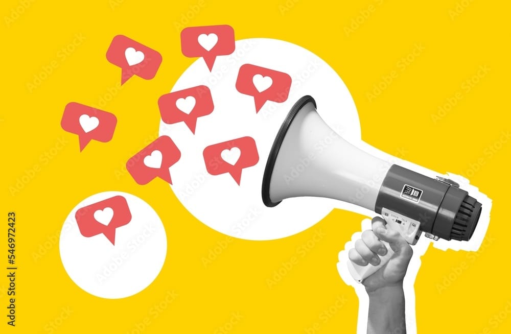 Hand with megaphone and likes icons, social media